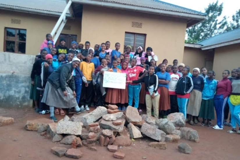 Sr. Sabina and program participants in village.