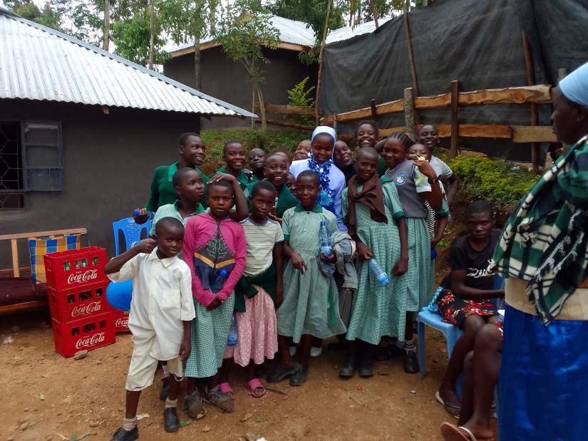 Sr. Lydiah with learners from her village after completing community service.