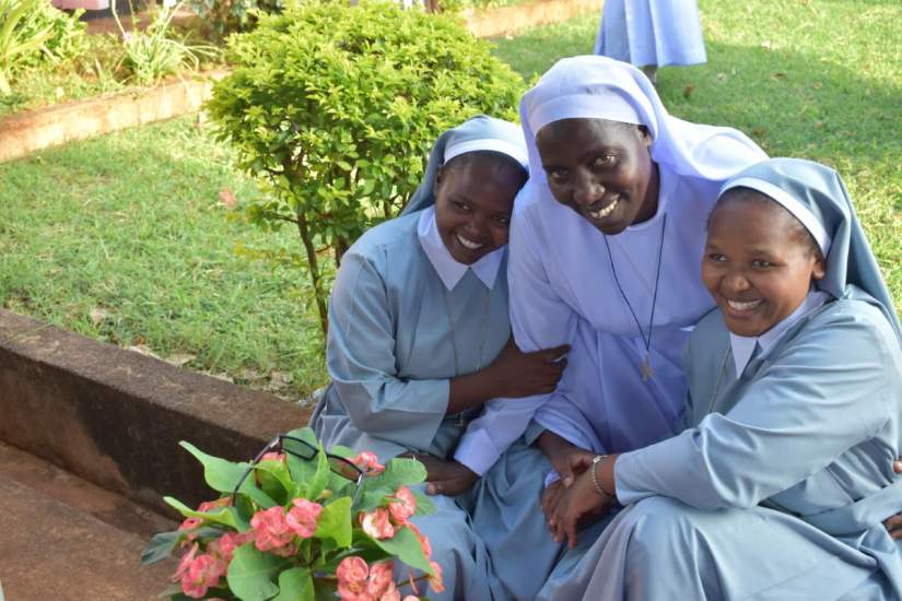 Sr. M. Tryphina Burchard, STH, ASEC Country Director (center), with two ASEC scholarship recipients during the 2021 Scholarship program orientation workshop in Tanzania.