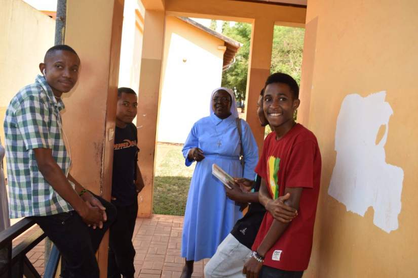 Sr. Draru talks with students of ASEC partner, Jordan University College (JUCO), in Morogoro, Tanzania.