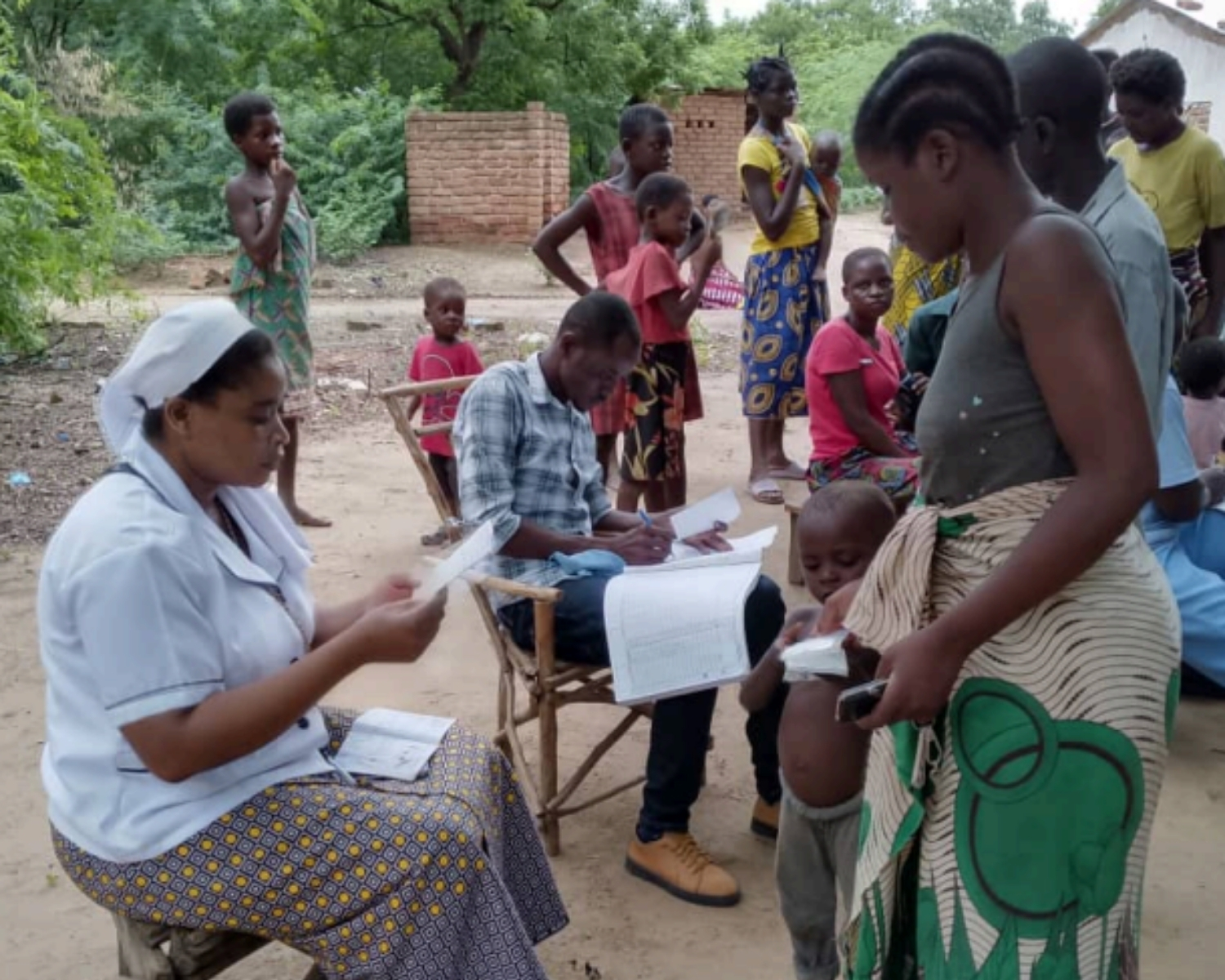 Sr. Maureen J. Chalamanda, SOL, providing treatment in her rural outreach program.