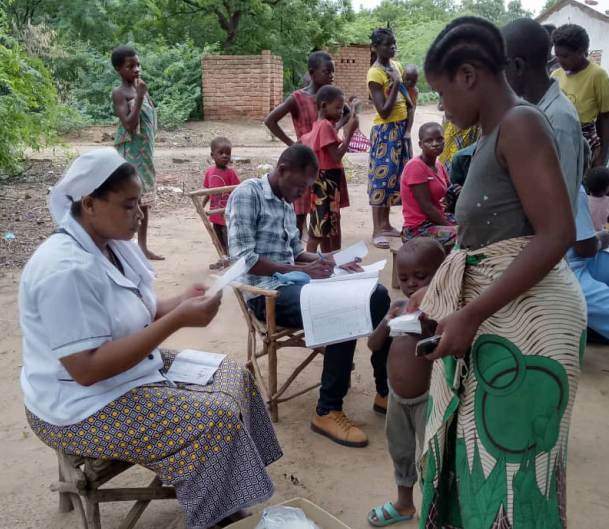 Sr. Maureen J. Chalamanda, SOL, providing treatment in her rural outreach program.