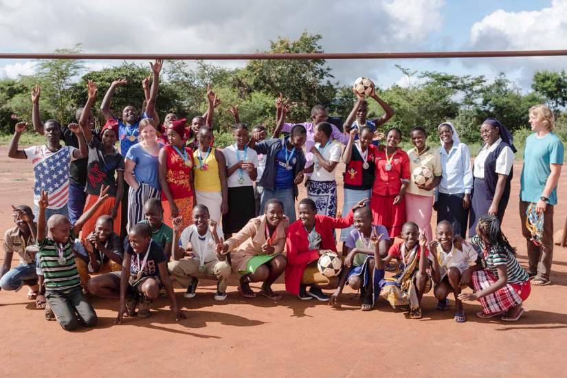 Sr. Faith Kamau and her group of children after playing sports at Nyumbani Village.