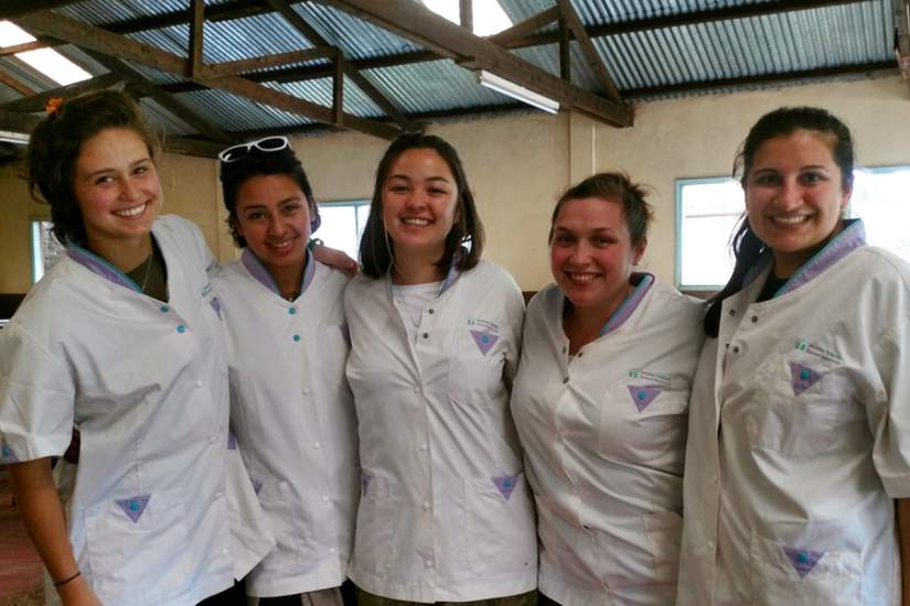 Service Learning students pose for a group photo during their service at St. Martin's Feeding Program.