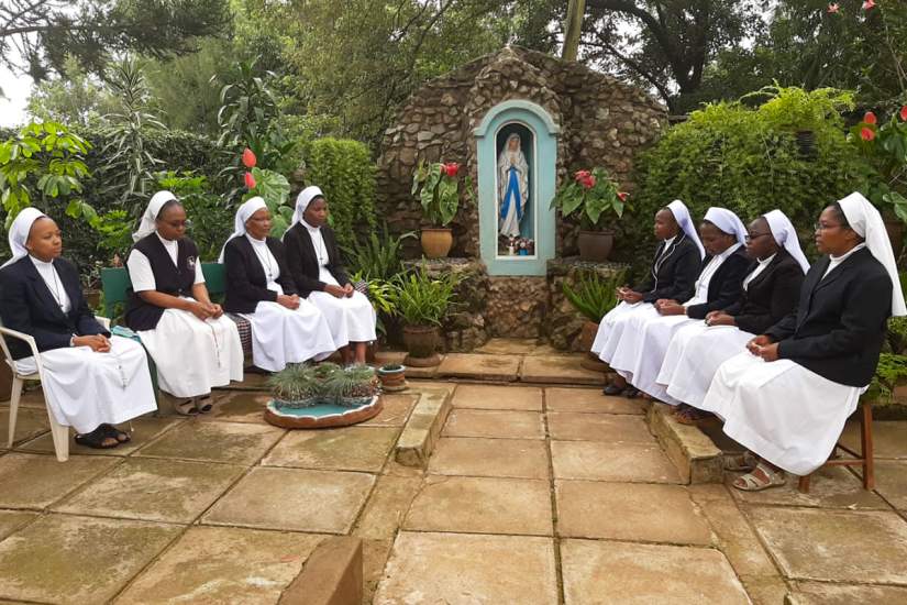 Sisters from ASEC's Higher Education for Sisters in Africa (HESA) program in Kenya, pray together.
