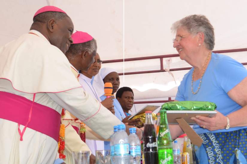 ASEC Board Member Dr. Jane Farr, traveled from the USA to Tanzania to attend Bigwa's Golden Jubilee celebration on ASEC's behalf. Here she is greeted by Bishop Joseph T. Lebulu.