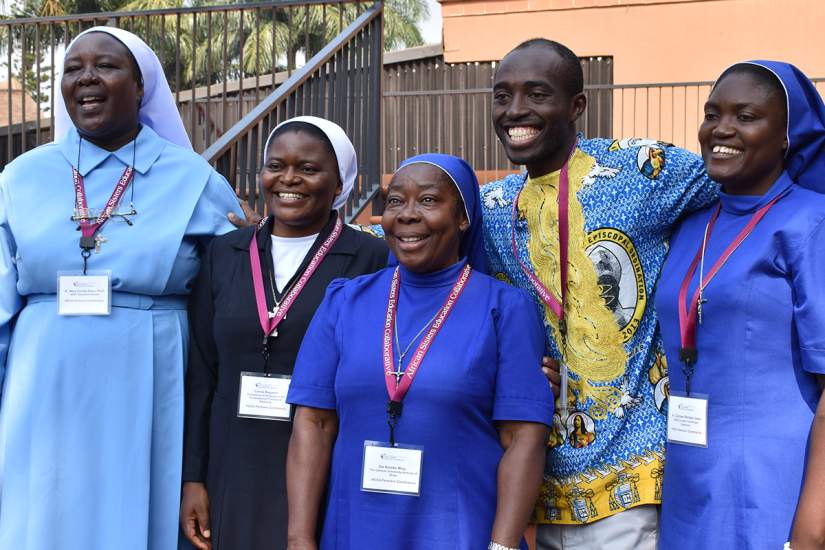 HESA partners from 10 countries traveled to Uganda for the first HESA conference held June 19-23 in Uganda. Here, ASEC Executive Director Sr. Draru Mary Cecilia, LSMIG, Ph.D. (left) joins HESA partners from Cameroon for a photo.