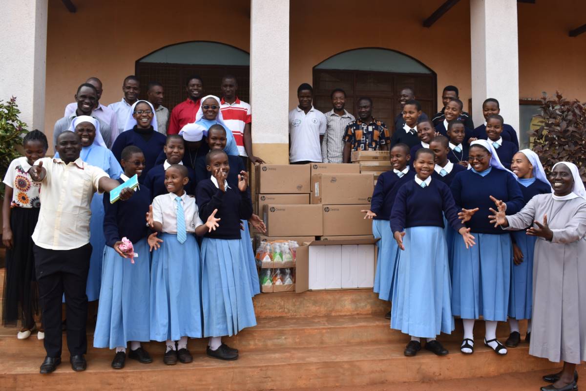 In celebration of their academic success, Bigwa students received the gift of 10 desktop computers from ASEC donors so they can continue to excel in their studies. As you can see, the students are so grateful to our donors!