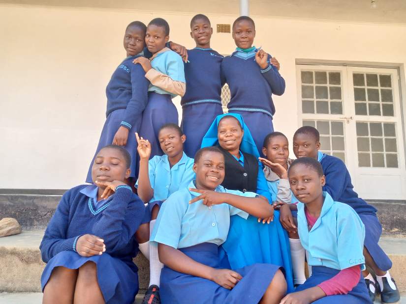 Sr. Agnes and her pupils, working to inform others about the consequences of deforestation.