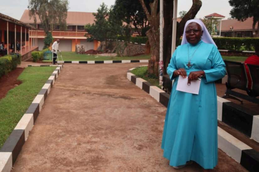 Sr. Regina on the grounds of Mapeera Bakateyamba Center in Uganda, where she leads efforts to care for the elderly and persons with disabilities.
