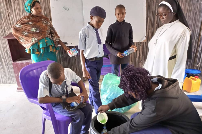 Students learn how to make soap during Entrepreneurial Month at Our Lady's Nursery in Nigeria.