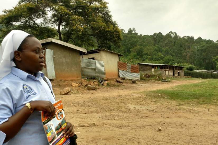 Sr. Lucia Nyamwija, OLGC, is now Headmistress of Boni Consilii Secondary School. Here, she's giving ASEC staff a tour of the grounds during a site visit in 2018.