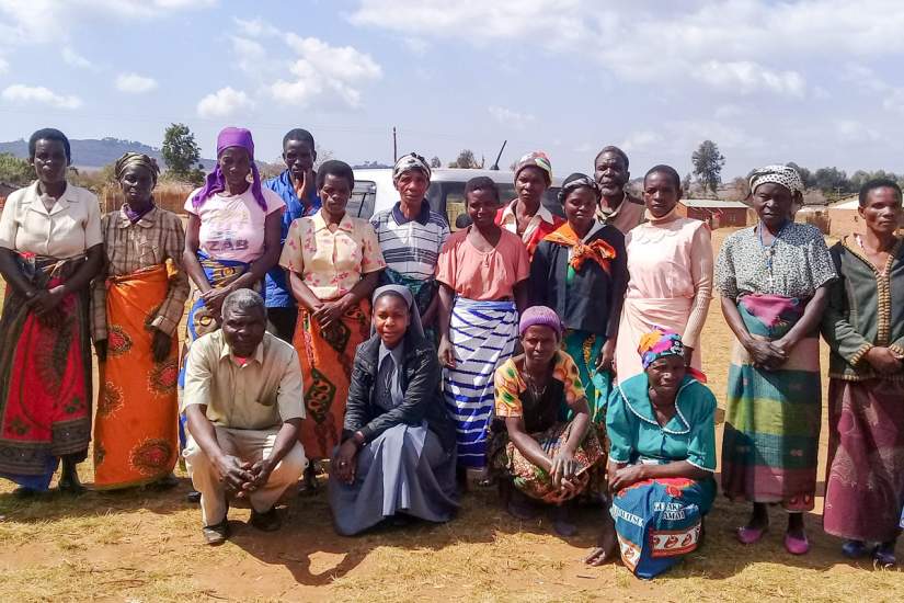 Members of a farmer support group pose with Sr. Teresa for a photo. She spearheaded a project to train nearly 50 farmers in new farming technology to help reduce food shortages in Gwaza Village in Dedza, Malawi. Of course, Sr. Teresa sent this photo along to funder of this project so they could see the impact their donation has made. This is key to donor retention.