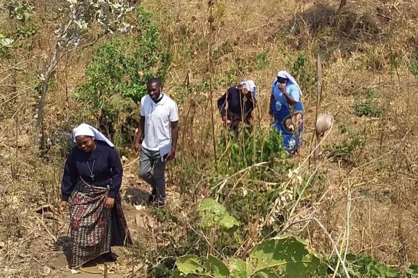 Working in the gardens with program participants.