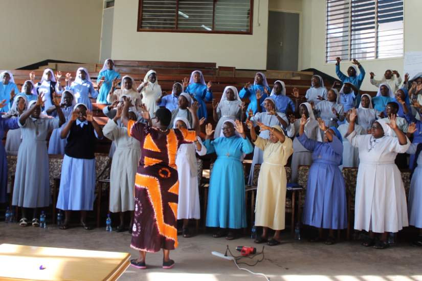Sisters join in prayer during a 2018 HESA workshop in Uganda.