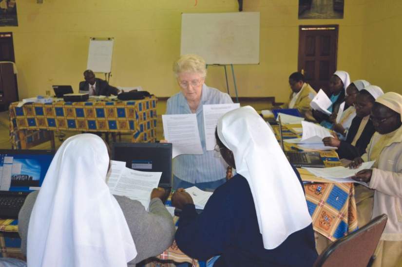 Sr. Margaret Gannon instructs HESA students in Nairobi at HESA orientation.
