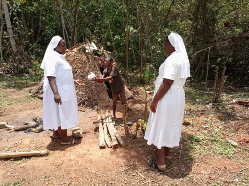 ASEC Sisters receive gifts as a part of their Lenten Visit.