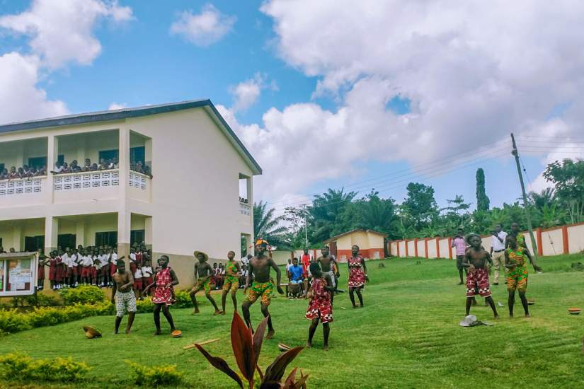 Students at Infant Jesus Preparatory school greet ASEC staff with song and dance (June 2018). Funding for the new wall (behind the students) was secured by SLDI alumna Sr. Irene Christine Oparku. Read about more infrastructure projects initiated by sisters.