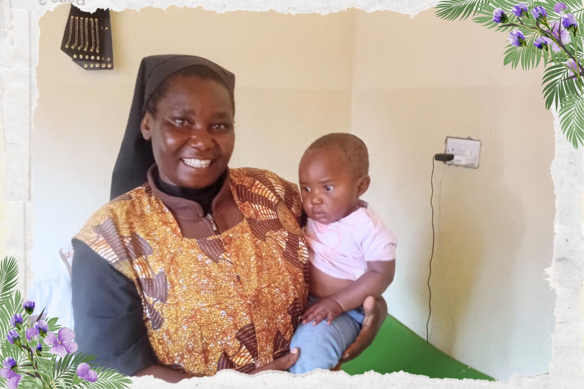 Sr. Sophia provides clothing and comfort to a child.