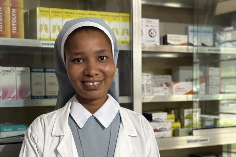 Sr. Catherine Felix Kimario, SCC, serves at Holy Cross Health Centre in Kihonda, Tanzania, where she educates patients on proper medication use to combat issues like antimicrobial resistance.