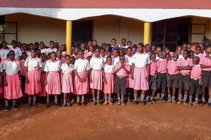 Primary school students in front of the new building at St. Matia, which was made possible by Head Teacher Sr. Betty.