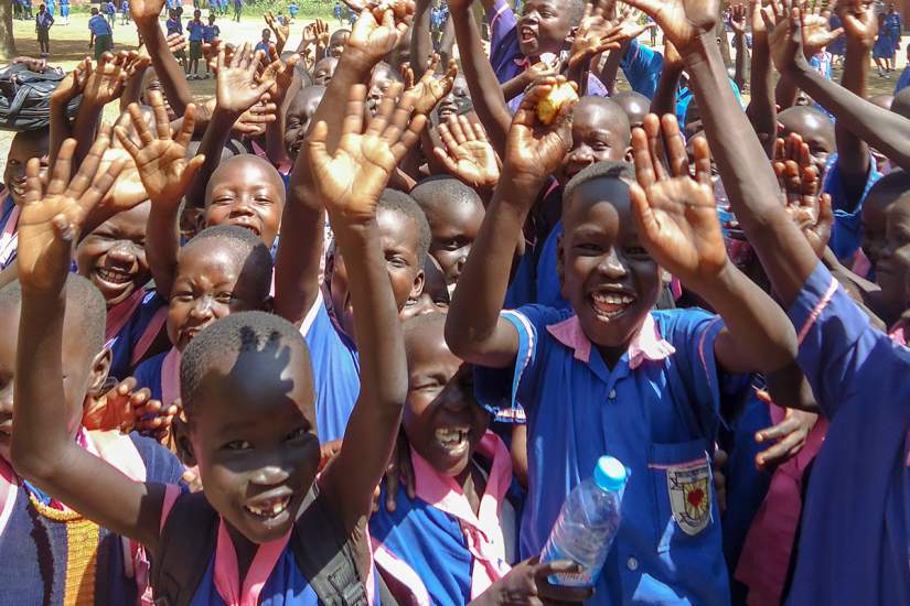 Students of Usratuna Primary School in Juba, South Sudan are overjoyed to receive new school supplies.
