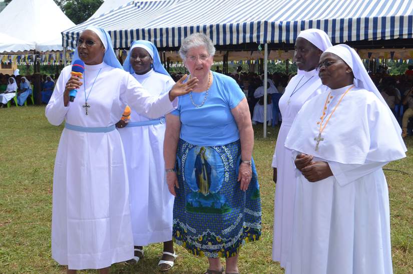 ASEC Board Member Dr. Jane Farr, introduces herself to the crowd at Bigwa's Golden Jubilee celebration. She traveled from the USA to Tanzania to attend the celebration on ASEC's behalf.