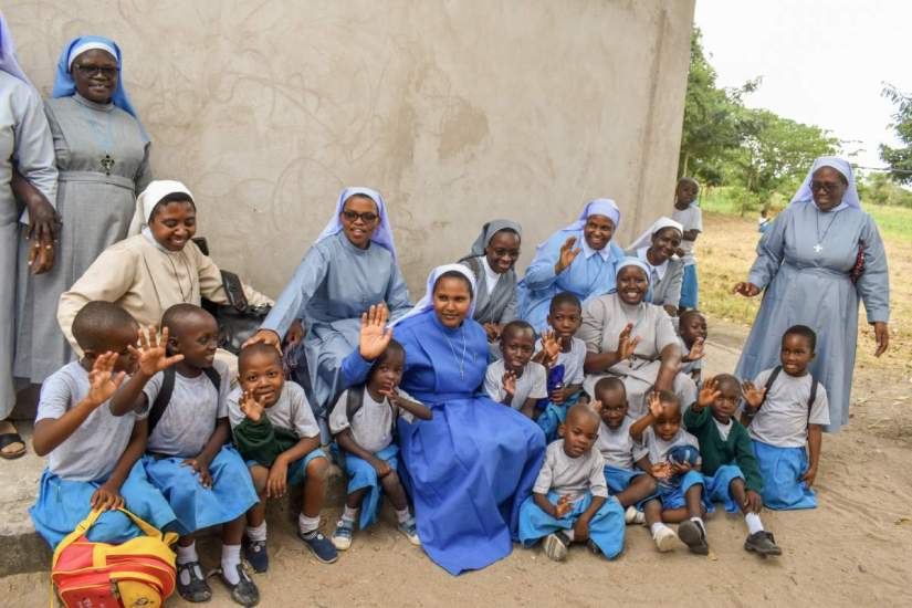 In Tanzania, participants of the SLDI Finance Workshop attend a field trip to Besone Pre & Primary School.