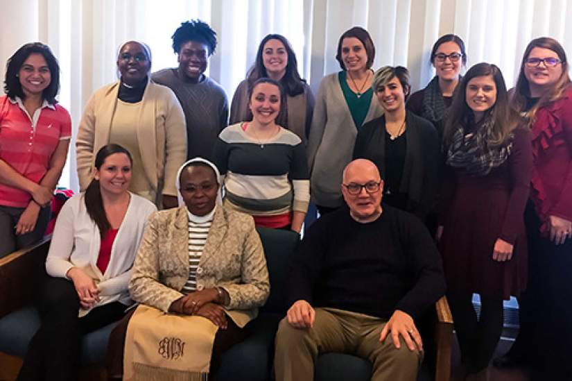 Sr. Jane poses with members of USA staff after her farewell luncheon on Friday March 3, 2017.