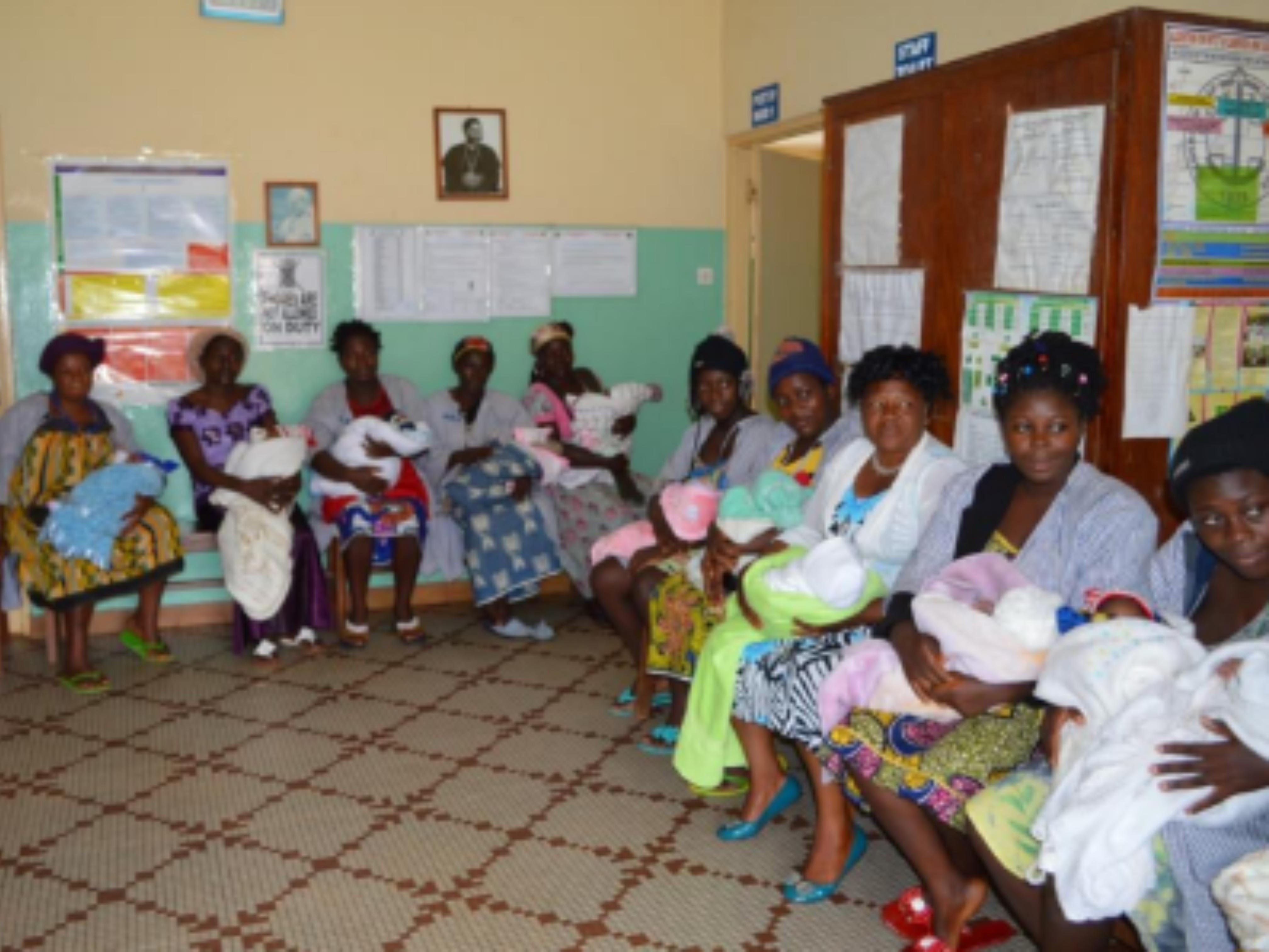 The obstetrical waiting room with mothers during health education.