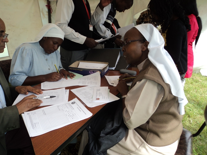 Sisters Mary Rose Koech and Mary Annett Namara study their coursework.