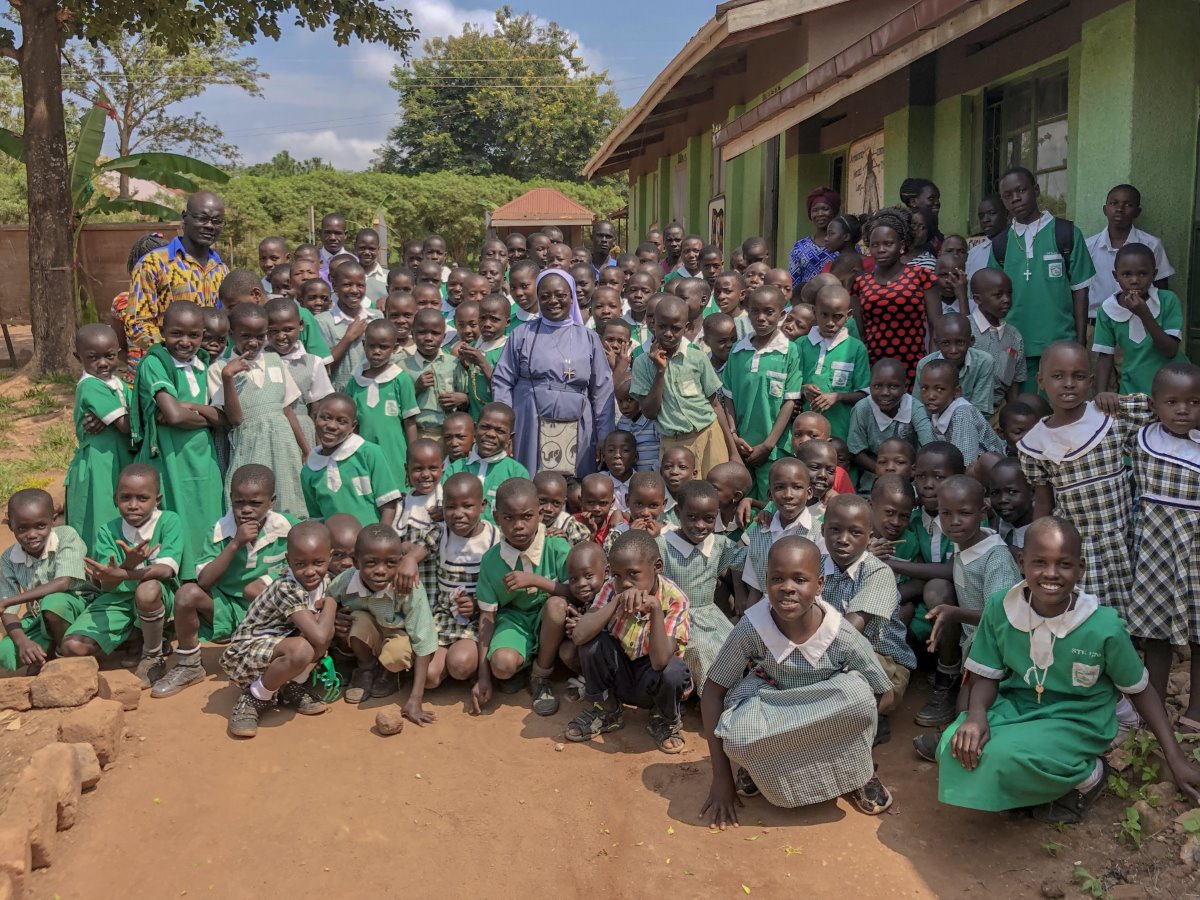 ASEC staff and partners visit to Kikyusa Primary & Secondary schools in Kikyusa, Uganda, run by the Sisters of Mercy of the Holy Cross (MHC).