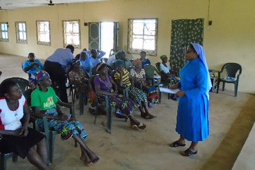 Sr. Veronica addressing beneficiaries on economic empowerment.