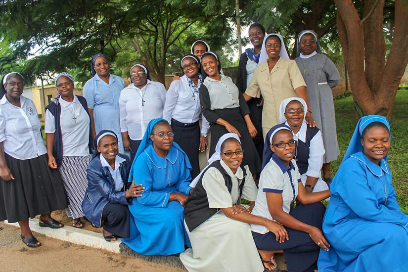 Sr. Matilda (standing, left) with her fellow ASEC classmates during the 2018 annual alumnae meeting in Zambia.
