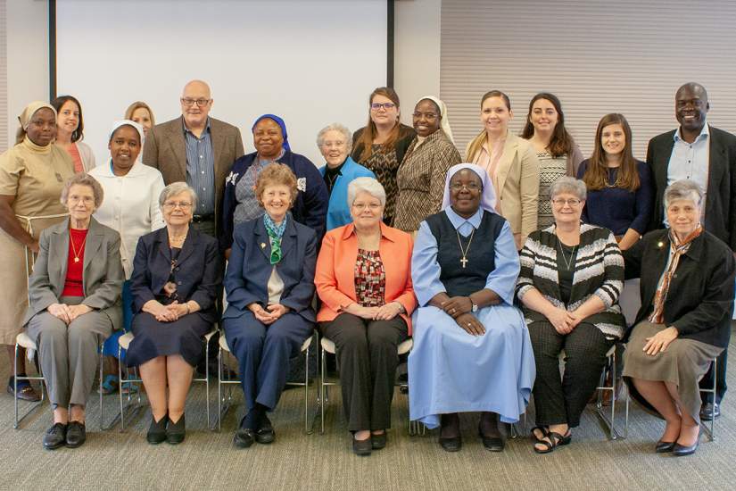 ASEC Board of Directors members pose with staff (April 26, 2018).