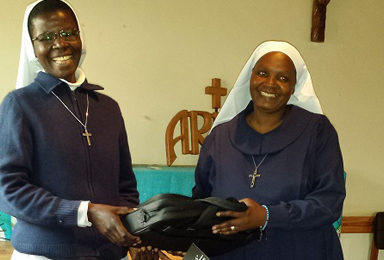 Sr.-Miilka-receiving-her-laptop