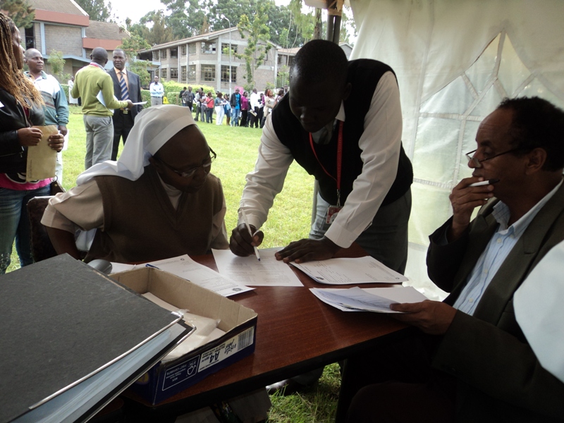 Sr. Mary Rose signs her bridge course agreement May 2013