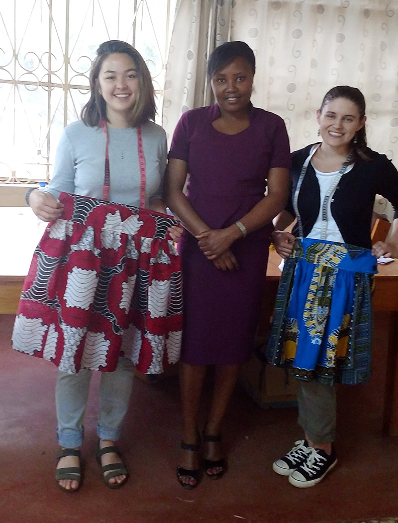 Making skirts with refugee women swing class with instructor Regina