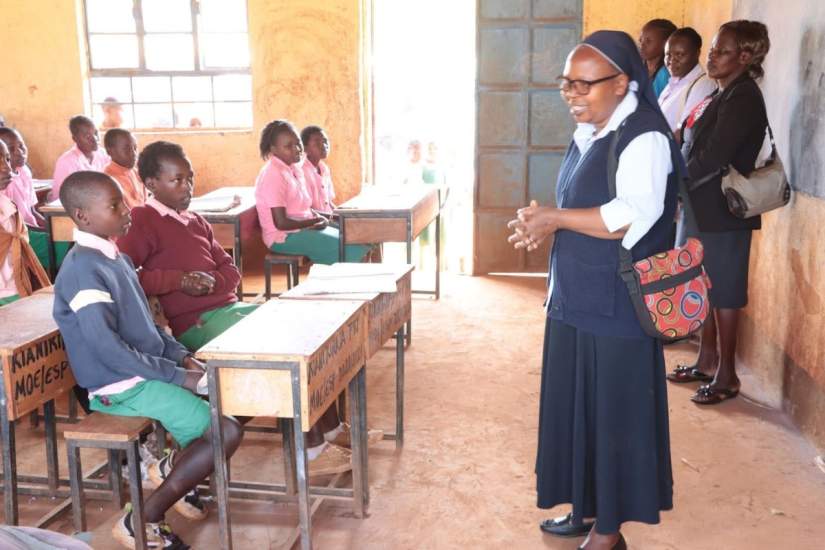 Sr. Lucy motivates and encourages child exam candidates in their education milestones.