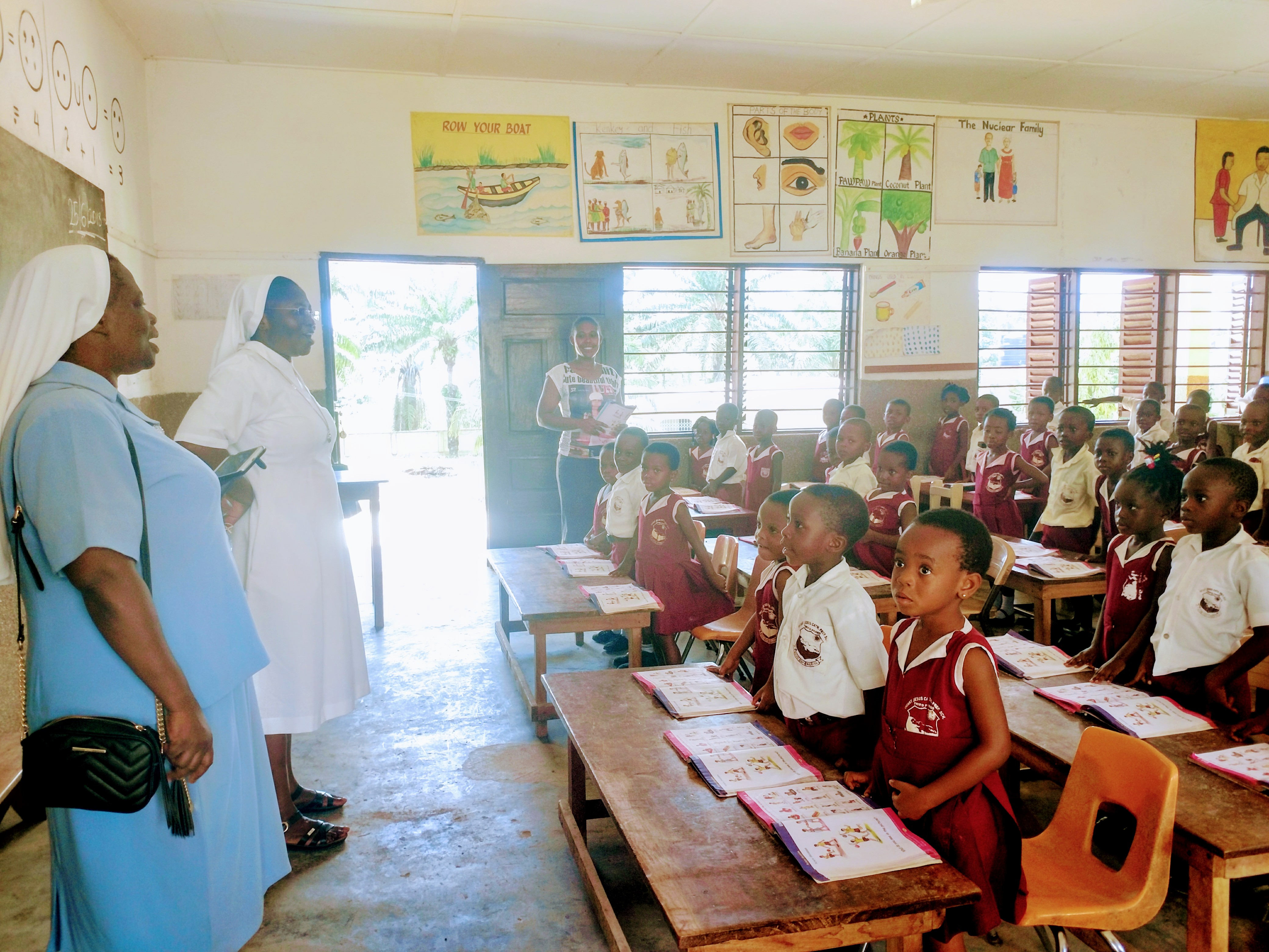 Students follow instruction during a 2018 visit to Infant Jesus Prep in Ghana.