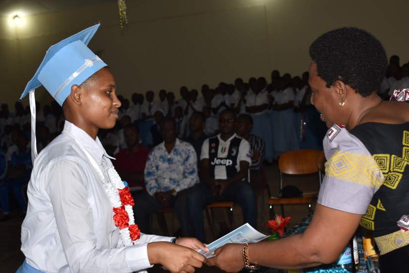 ASEC scholarship recipient Fidesta Mashambo graduates from Bigwa Secondary School in 2019. Her academic performance at Bigwa contributed to the school's most improved academic performance award.