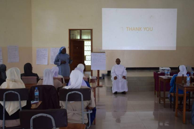 Tanzania ASEC Programs Coordinator (Sr. Maria Telesphora, COLU), thanking the staff and graduates after a reflective learning workshop on the graduation from Mwenge Catholic University.