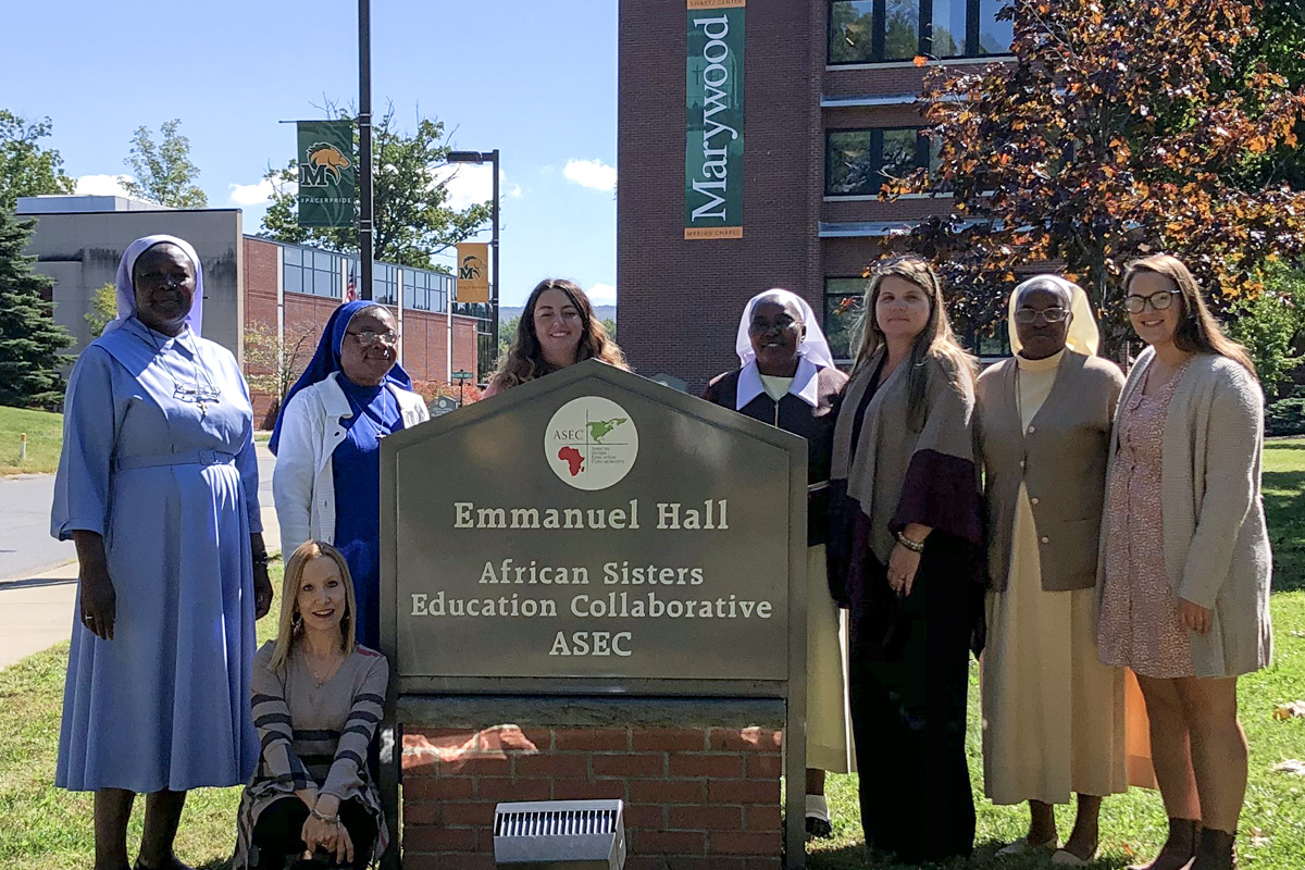 Sr. Margaret Mary Dione Ajebe-Sone, SST, M.Ed. of Cameroon (standing, 2nd from left) visiting with ASEC staff at Marywood University. Sr. Margaret is the fifth Sister scholar accepted for a six month research fellowship with ASEC partner, the Center for Applied Research in the Apostolate (CARA), Georgetown University.
