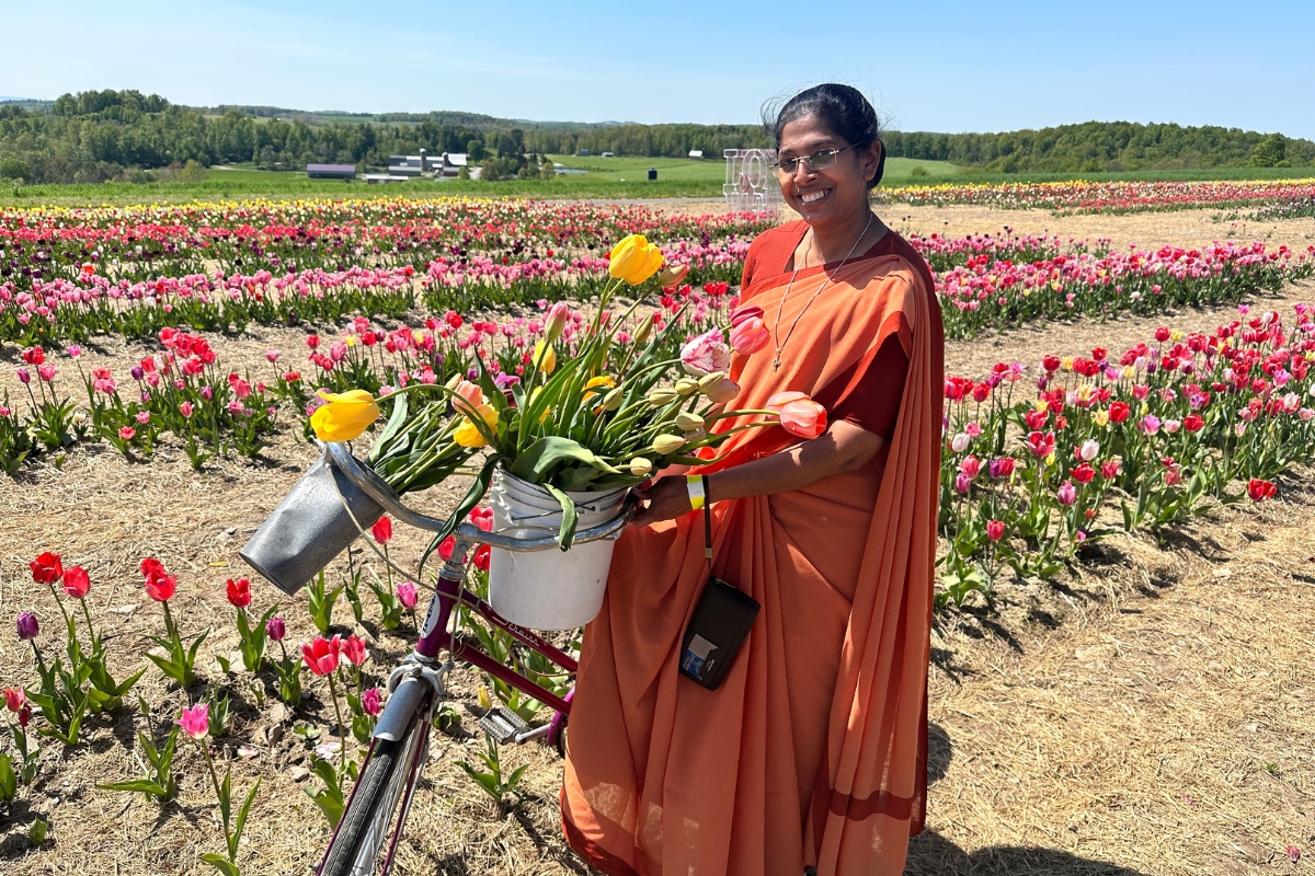 CARA-ASEC Visiting Scholar from India tours a tulip field during her stay at ASEC Headquarters in Scranton, PA, USA.
