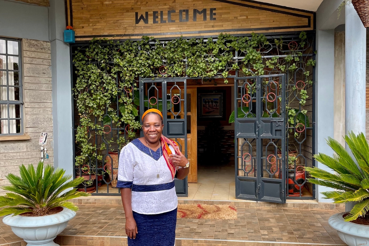 Sr. Georgette outside of Roussel House