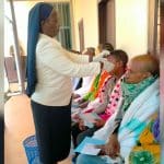 Sr Charity Nyawira Gathungu MSHR removes dressing post surgery