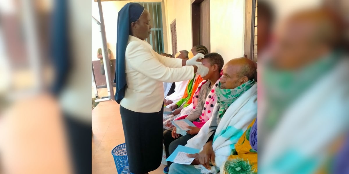 Sr Charity Nyawira Gathungu MSHR removes dressing post surgery