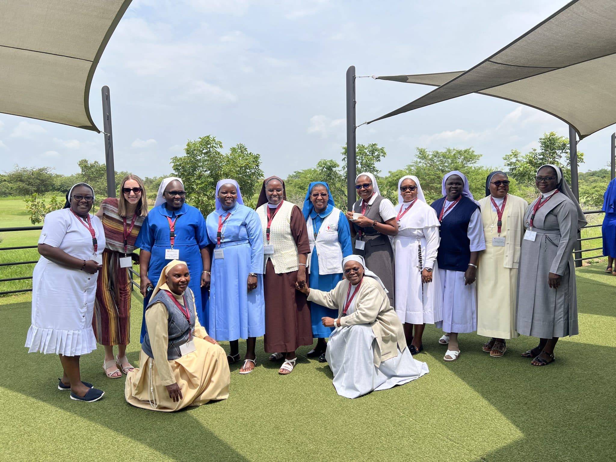 Megan with ASEC staff and alumnae during the workshop in Zambia reflecting the strong sense of community and collaboration that shaped the week